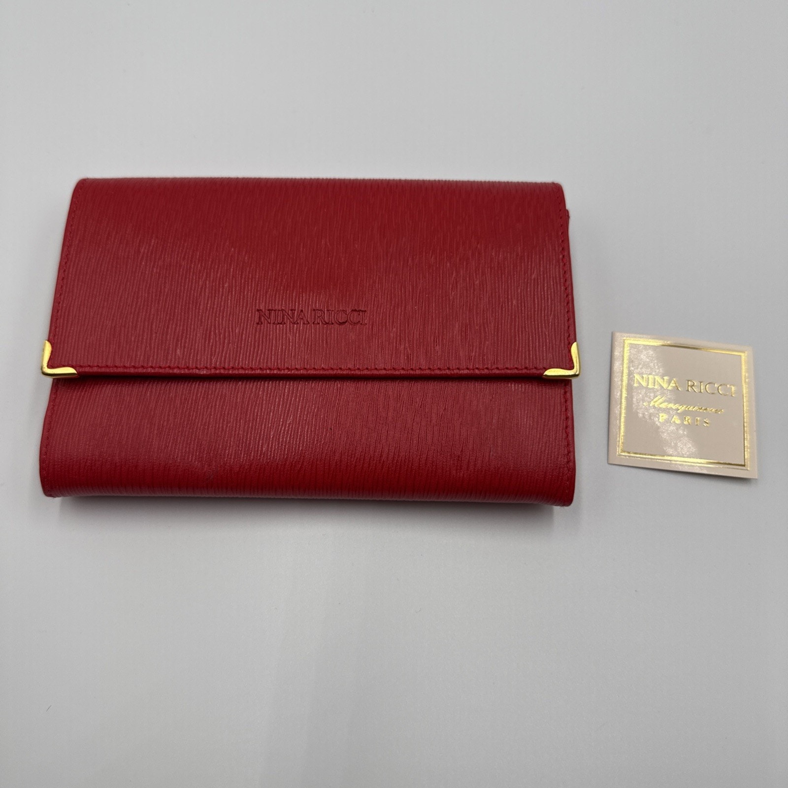 Authentic Nina Ricci Wallet Logo Clasp Bifold Wallet Embossed Leather Red